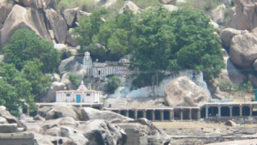 The Chakratheertha Kodandaramaswamy Mandira (below) seen with the Yantrodaraka Hanuman Mandir (above) from the other side of the river, Hampi